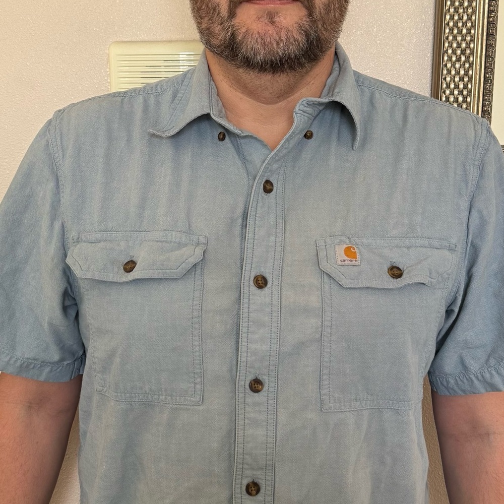 Short sleeve medium carhartt shirt . Blue only worn twice .